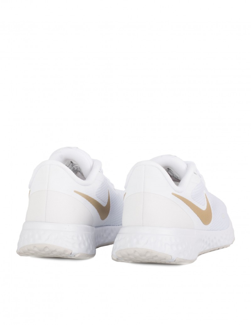 Deportivas Nike blancas logo dorado