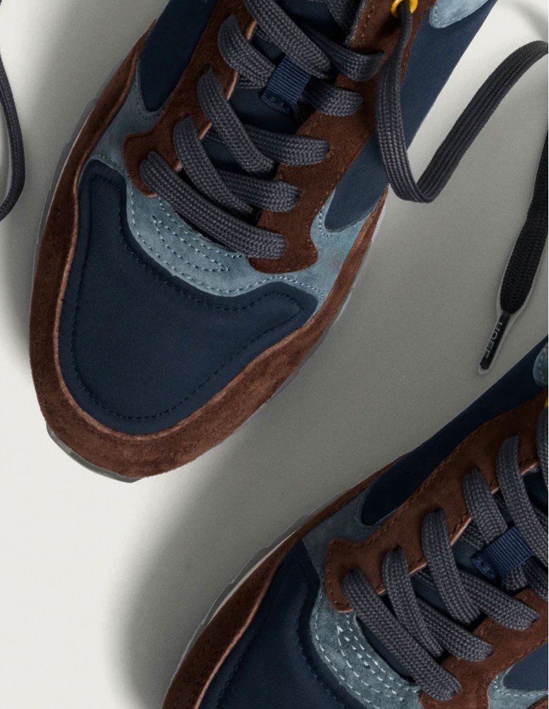 detalle zapatillas hoff para hombre azul y café