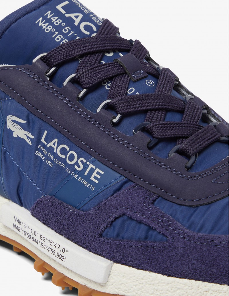 detalle logo Lacoste Elite Active