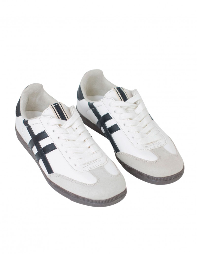 zapatillas blancas rayas negras